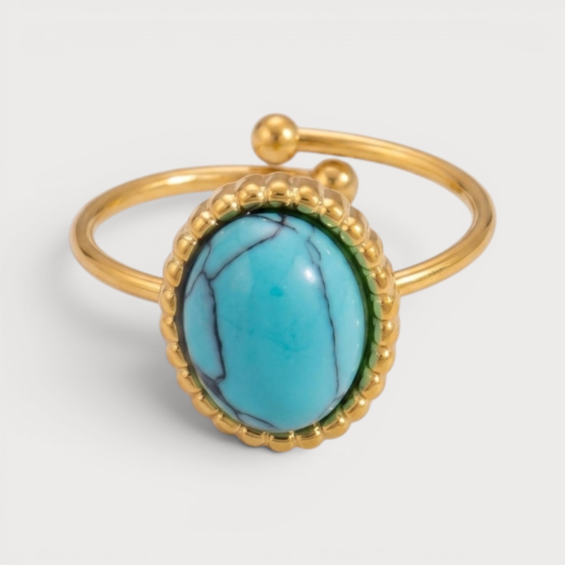 Bague Josette dorée, pierre ovale bleu turquoise à bordure perlée