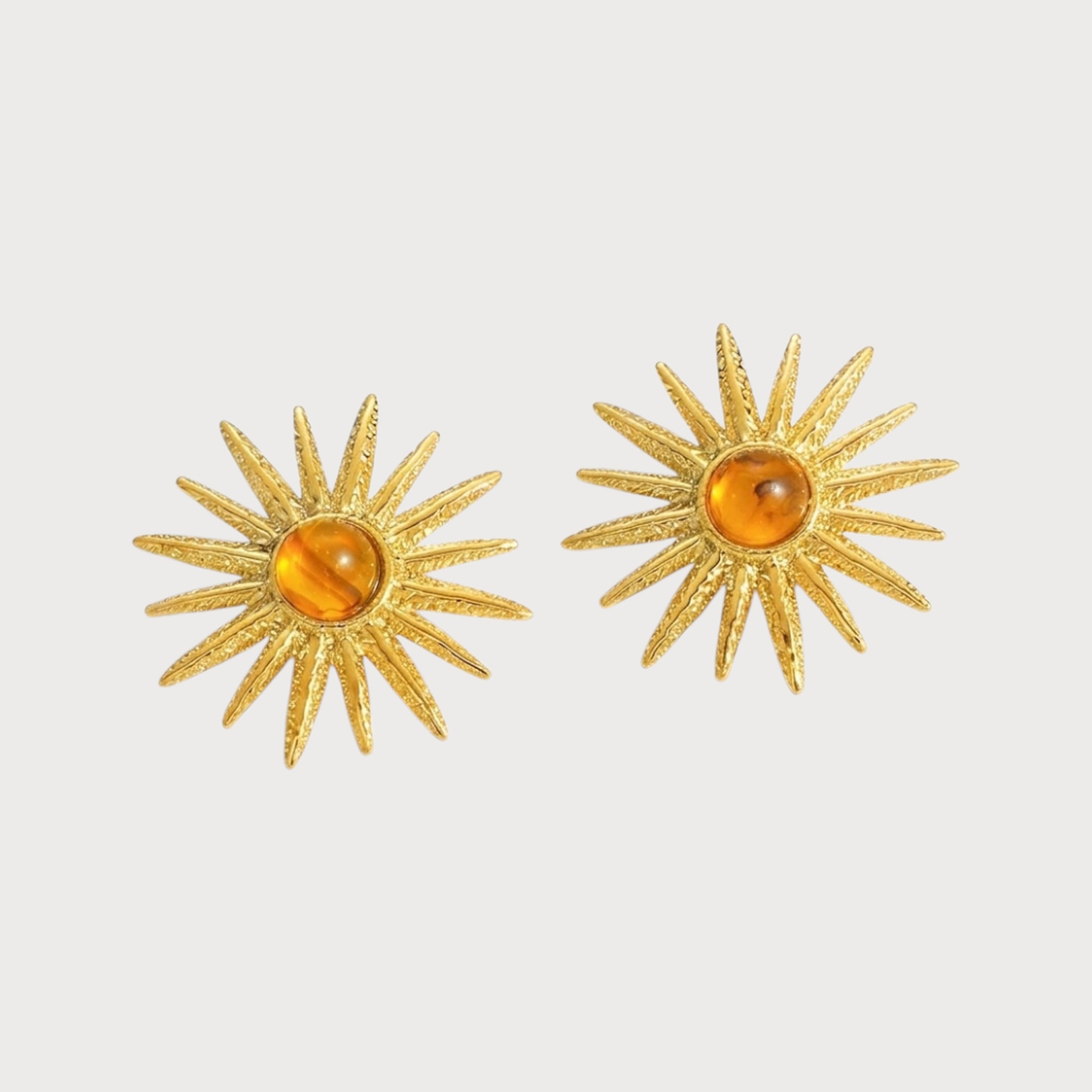 Puces d’oreilles soleil à cabochon ambré en acier inoxydable doré
