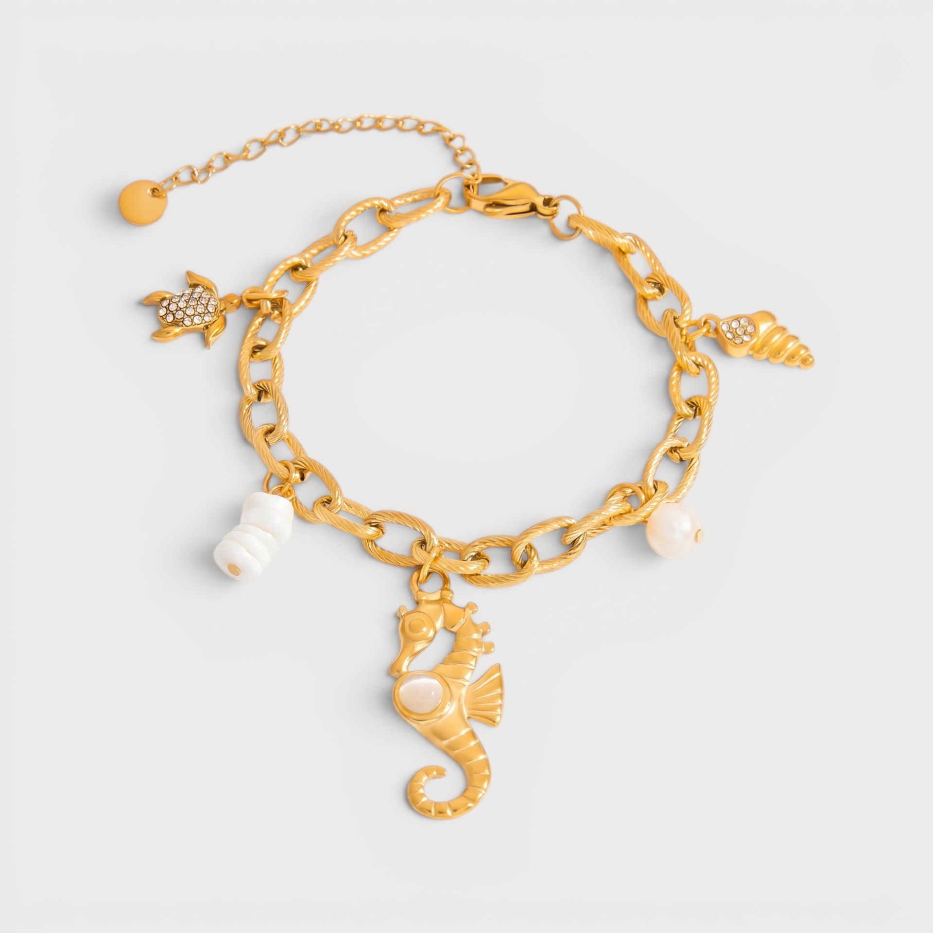 Bracelet tortue, hippocampe et coquillage sertis de pierres claires