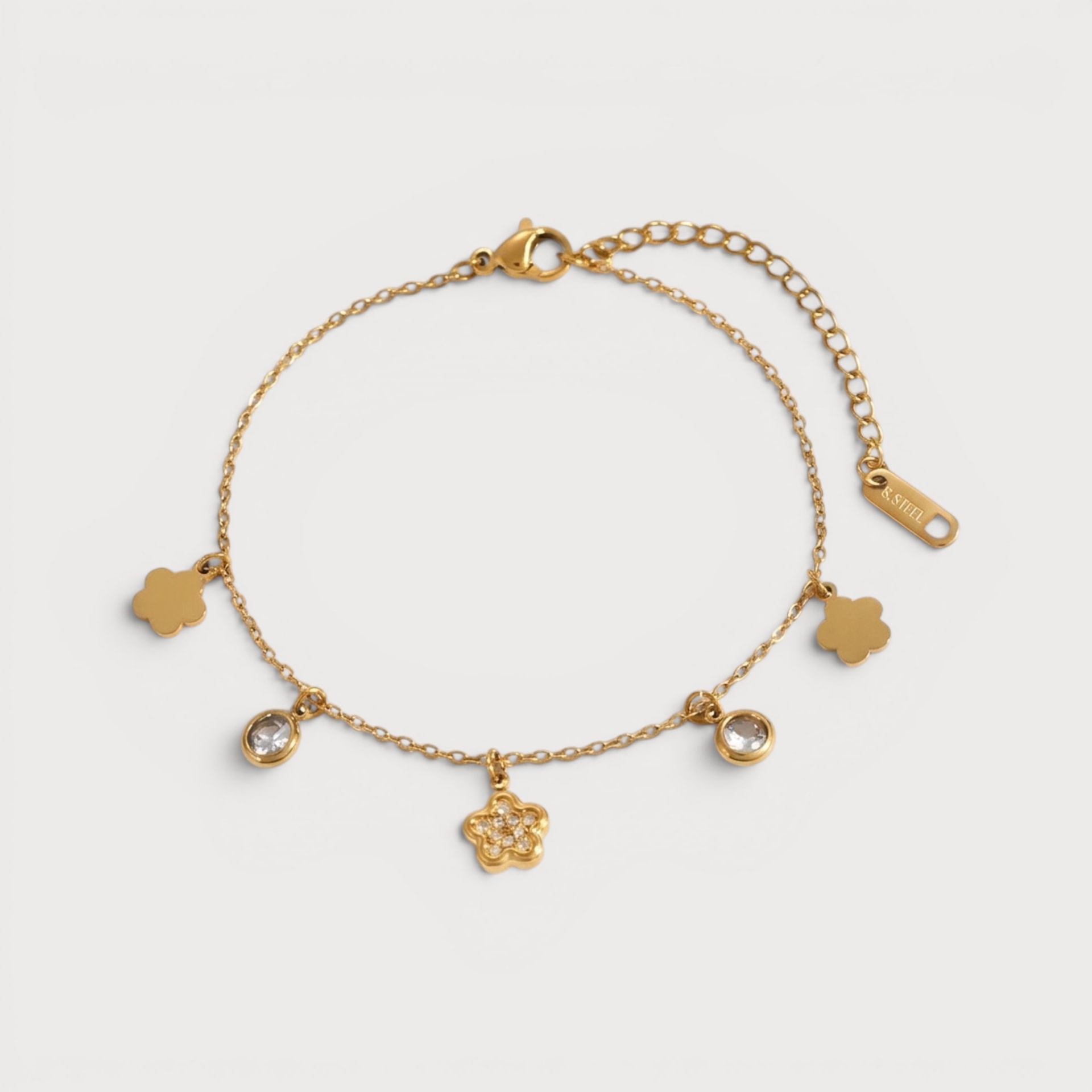 Bracelet fleurs à pierres claires en acier inoxydable doré