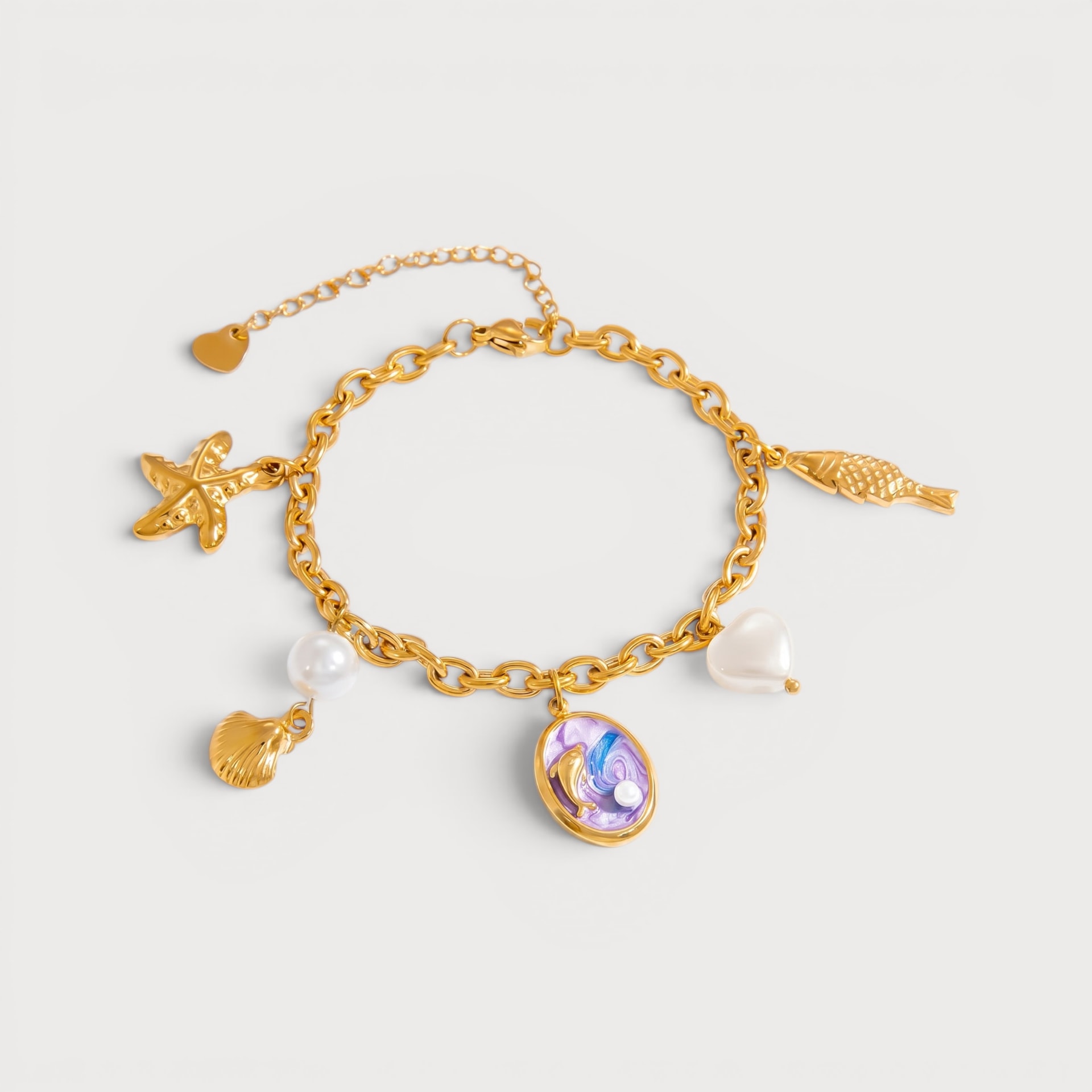 Bracelet étoile de mer, poisson et dauphin émaillé doré