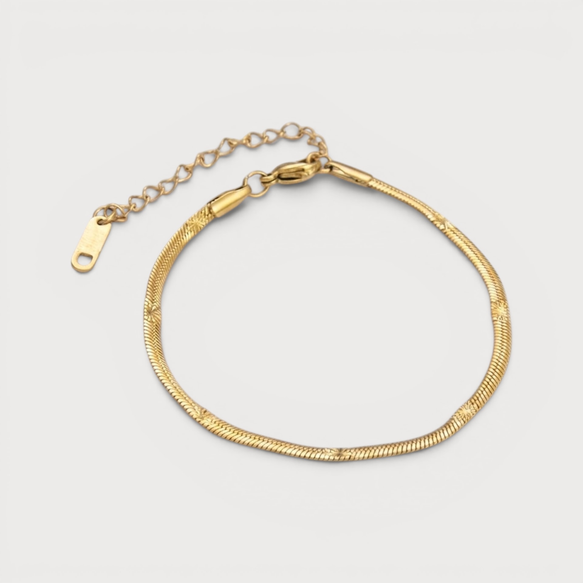 Bracelet chaîne serpent étoiles gravées en acier inoxydable doré