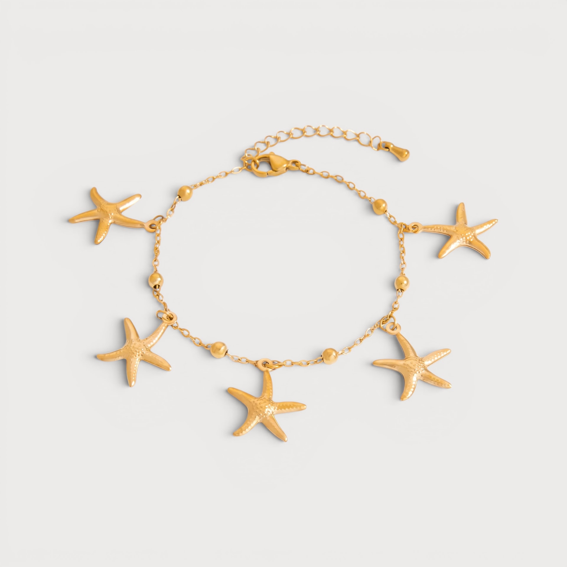 Bracelet étoiles de mer en acier inoxydable doré