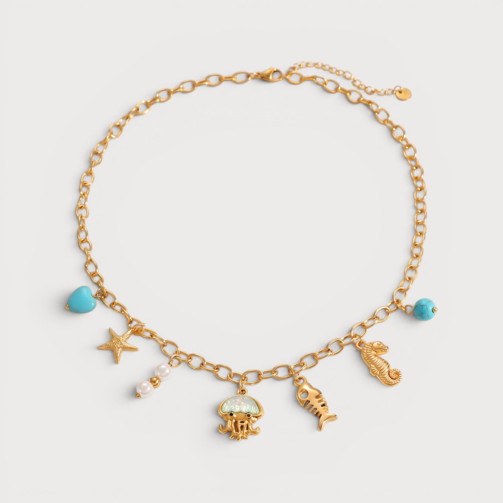 Collier breloques méduse, étoile de mer, hippocampe et arête, doré | Bloom × Blaze
