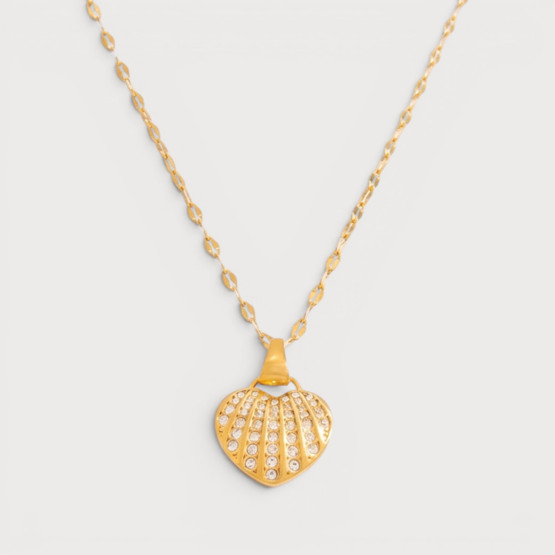 Collier à cœur et pierres claires en acier inoxydable doré